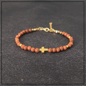 bransoletka zloty krzyzyk piasek pustyni